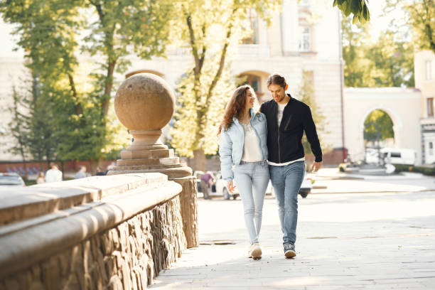 istock Beautiful couple spend time in a spring city 1265957898