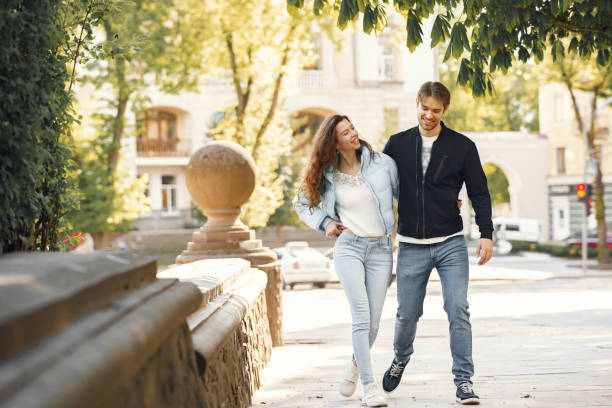 istock Beautiful couple spend time in a spring city 1265957920