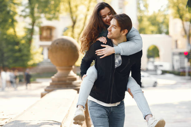 istock Beautiful couple spend time in a spring city 1265957927