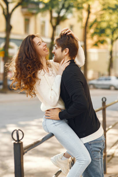istock Beautiful couple spend time in a spring city 1265958027