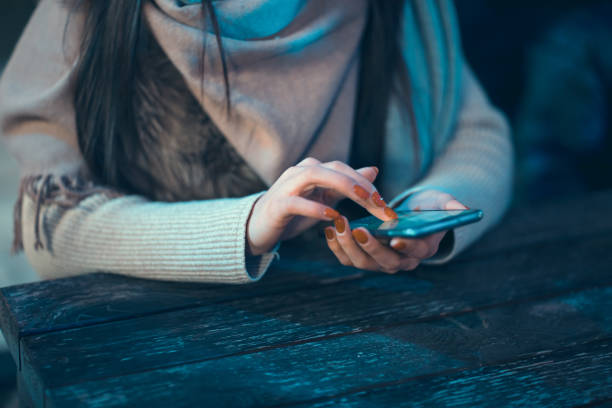 istock woman hand smart phone 1265962744