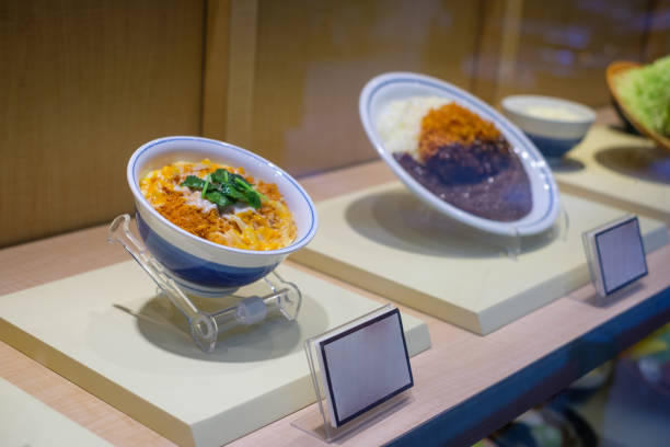 fake, plastic food models in asian restaurant window -