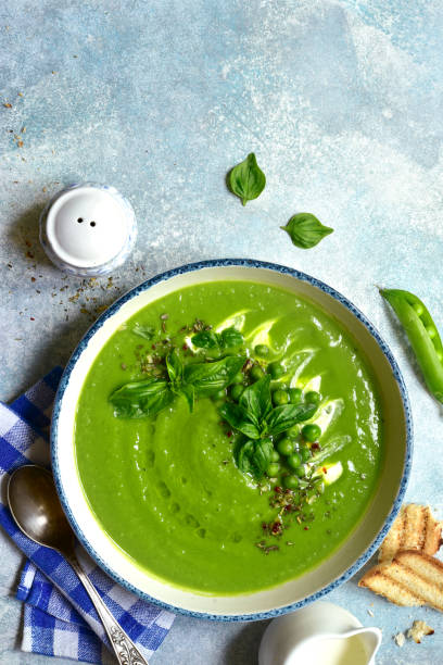 istock Pureed green pea soup with cream 1265970043