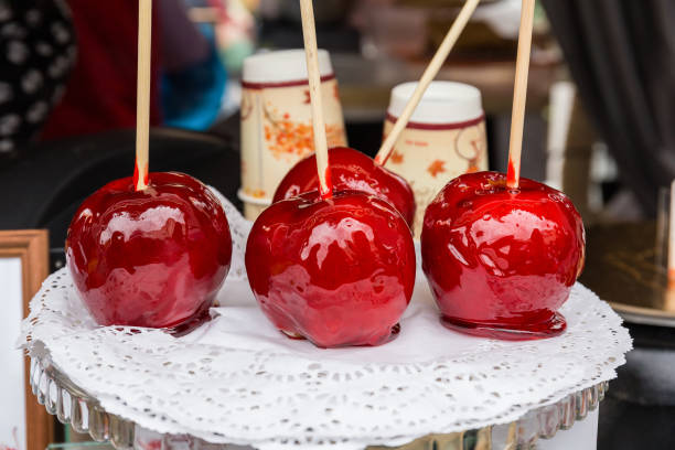 istock Red apples drenched in honey. 1265972117