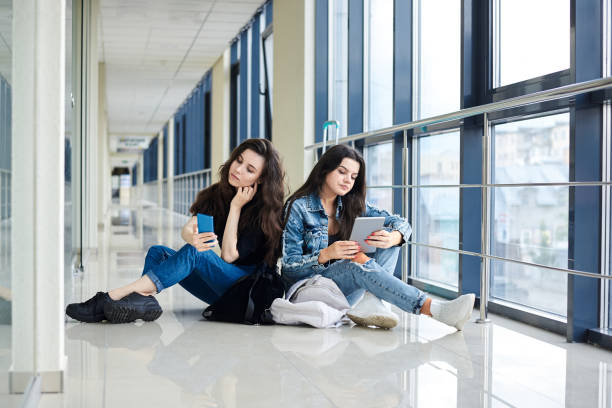 istock Girlfriends traveling by air 1265976977
