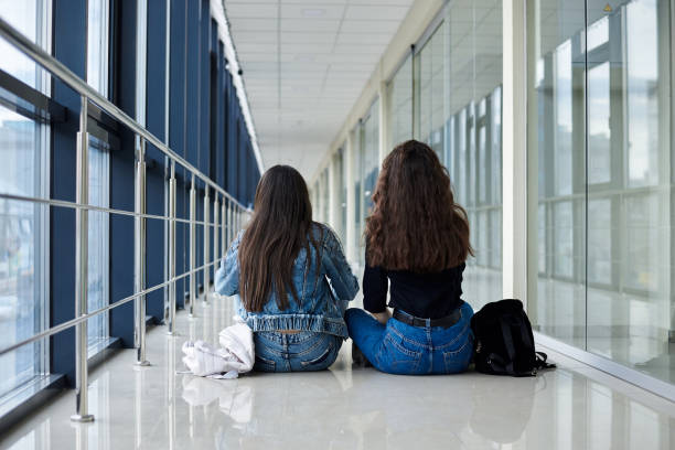 istock Girlfriends traveling by air 1265977668
