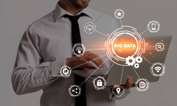 istock Collage with businessman working on laptop, words BIG DATA and cyber icons on virtual screen 1265984165