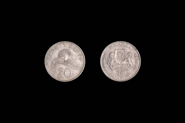 istock Twenty Singapore cent 1987. isolated on black background 1265984688
