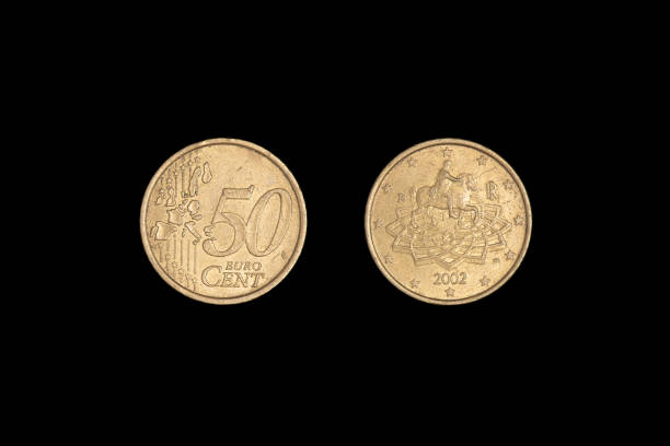 istock 50 euro cent coin 2002 on a black background. Close-up on two sides. 1265985796
