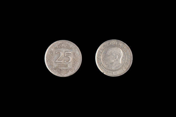 istock 25 Turkish kurus coin, 2009, both sides. Black background. 1266001796
