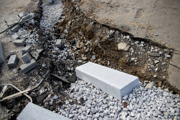 istock Reconstruction of the sidewalk and replacement of old curbs. Construction zone 1266010750