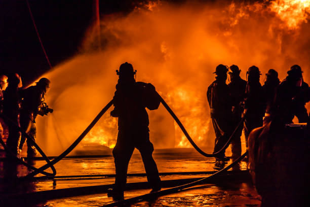 istock Firefighters extinguishing the large flames 1266019472
