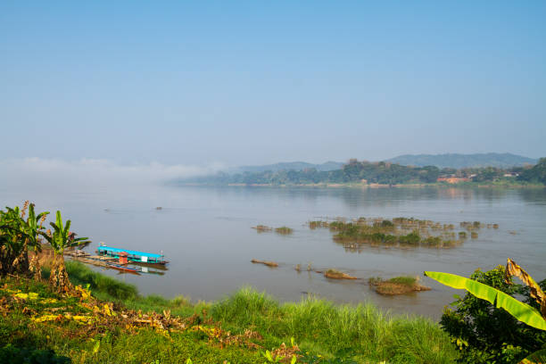 istock Idyllic Mekong river at Chiangkham and Laos in background 1266019991