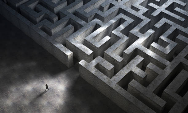 istock Man entering a huge mysterious maze. 3D Rendering 1266031209
