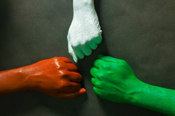 istock three hands are painted with three colors,saffron,white and green to represent tricolor Indian national flag.15 August Independence day India.celebration of freedom.symbol of brotherhood. 1266031976