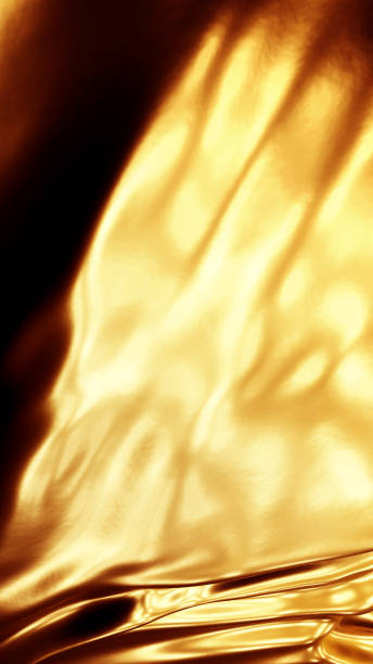 istock Gold surface with pleats, luxury gold fabric. Gold and black, 1266038338