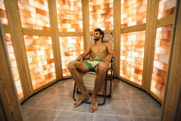 istock Young man in a salt room 1266038462
