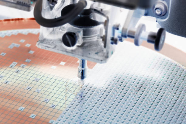 istock Pick up silicon die in silicon wafer in die attach machine in semiconductor manufacturing 1266044698
