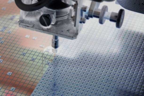 istock Pick up silicon die in silicon wafer in die attach machine in semiconductor 1266044699