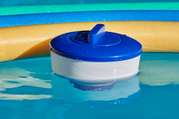 istock Chlorine buoy and colorful pool noodles. 1266047764