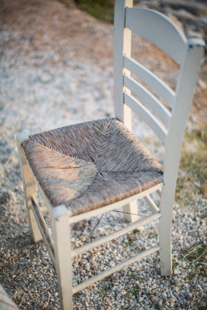 istock Wooden chair on the beach 1266054831
