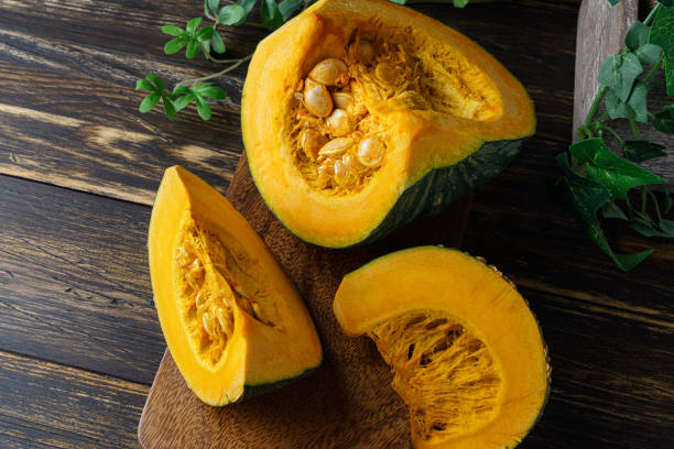 istock Fresh Japanese pumpkin with pumpkin seeds 1266057046