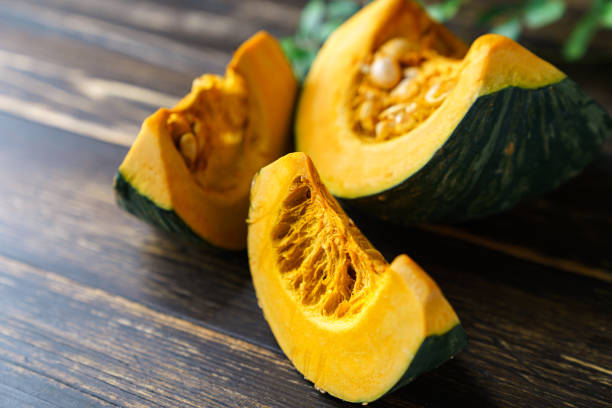 istock Fresh Japanese pumpkin with pumpkin seeds 1266057578
