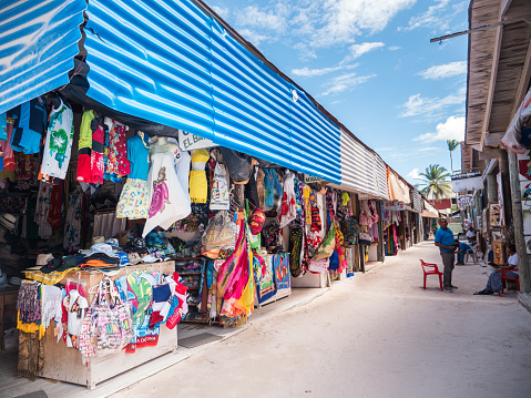 Bavaro, Punta Cana, Dominican Republic - 4 February 2019: Souvenirs shops with different goods on beach Bibijagua