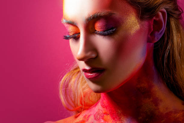 istock Bright makeup and face art, close-up portrait. Creative makeup, 1266066954