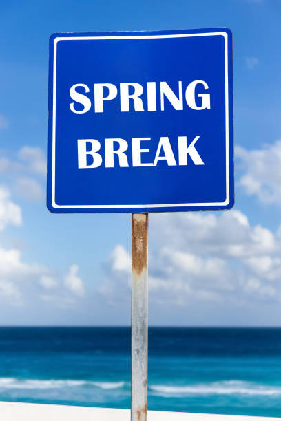 istock Words Spring Break on blue road sign 1266072711