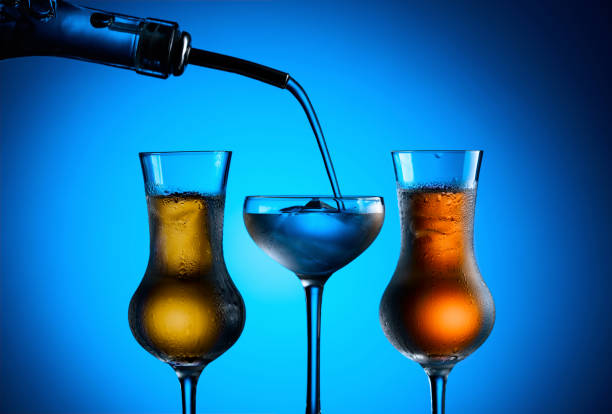 Small glass with blue water
