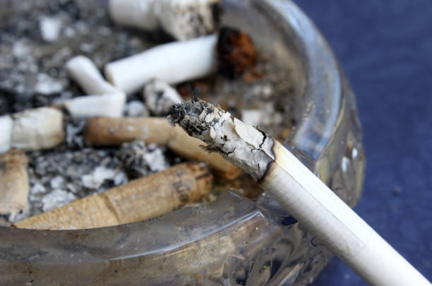istock close-up cigarette butt in ashtray 1266094188