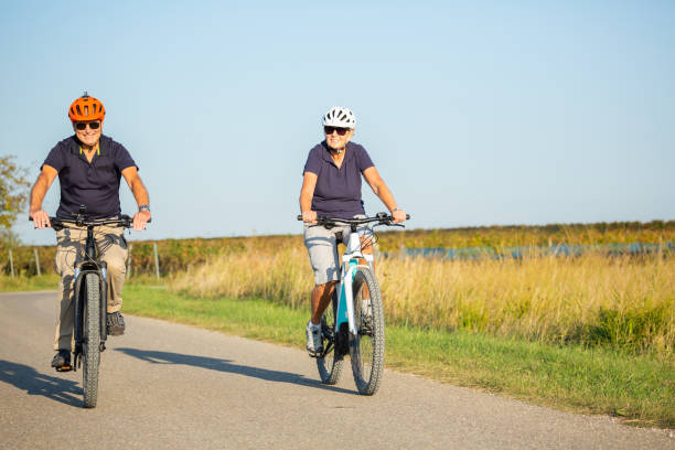 istock smiling active seniors on cycling tour in summer 1266094238