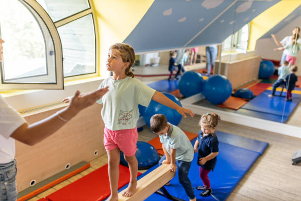 istock Young female therapist working with kids 1266102406