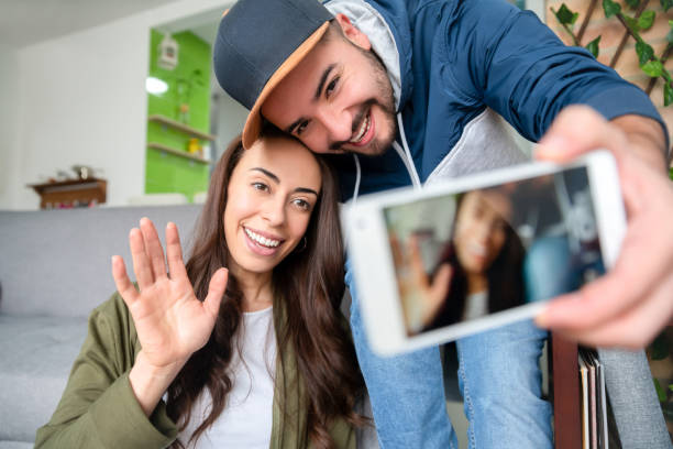 istock Happy influencer recording at home with her husband 1266103801