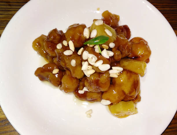 Sweet and Sour Pork with pine nut