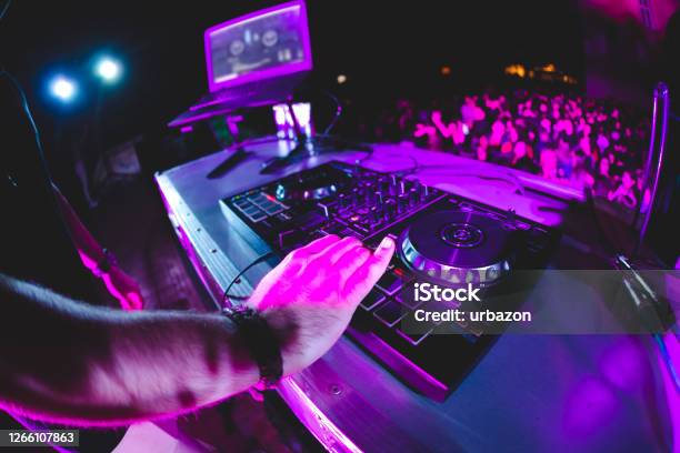 Dj Playing And Mixing Music At Party Stock Photo - Download Image Now - DJ, Entertainment Club, Electro Music