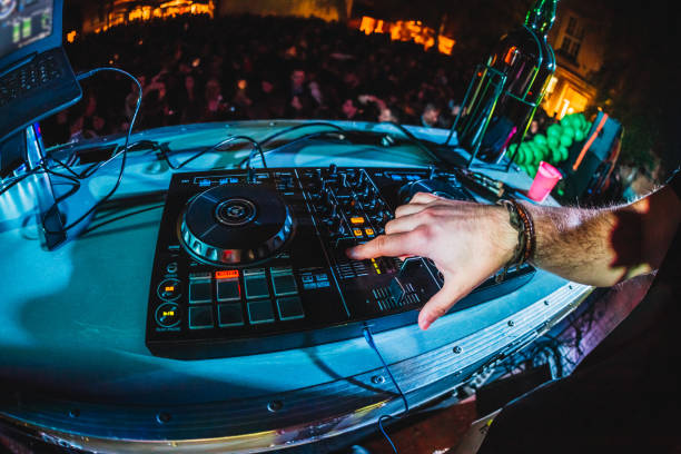 istock DJ playing and mixing music at party 1266107925