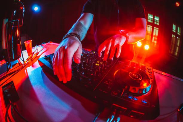 istock DJ playing and mixing music at party 1266107993