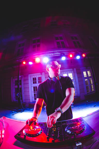 istock DJ playing and mixing music at party 1266108090