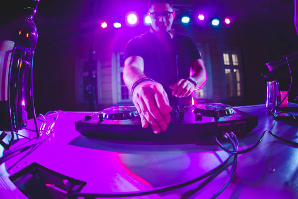 istock DJ playing and mixing music at party 1266108143
