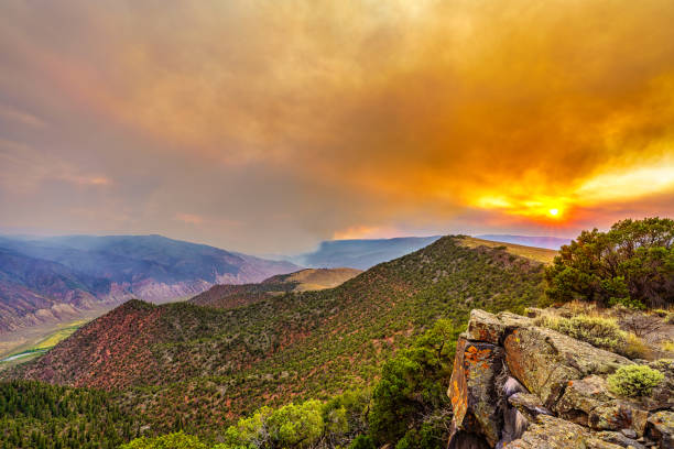 istock Wildfire Fire and Smoke Sunset Landscape 1266112990