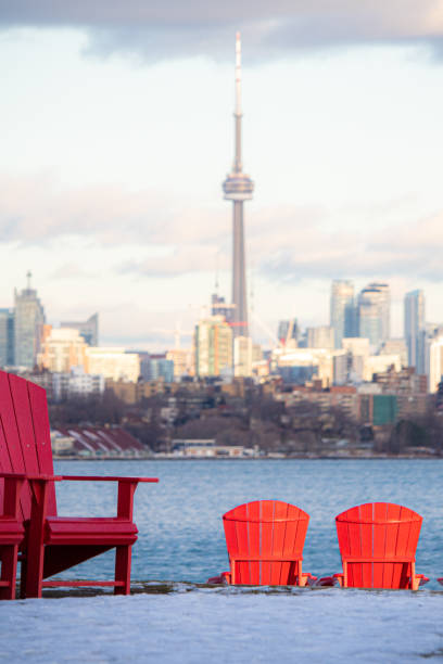 Large colorful chairs overlooking the Toronto skyline at Sheldon Lookout, located within Humber Bay Park. Toronto, Ontario - December 5, 2019 : Large colorful chairs overlooking the Toronto skyline at Sheldon Lookout, located within Humber Bay Park. etobicoke stock pictures, royalty-free photos & images
