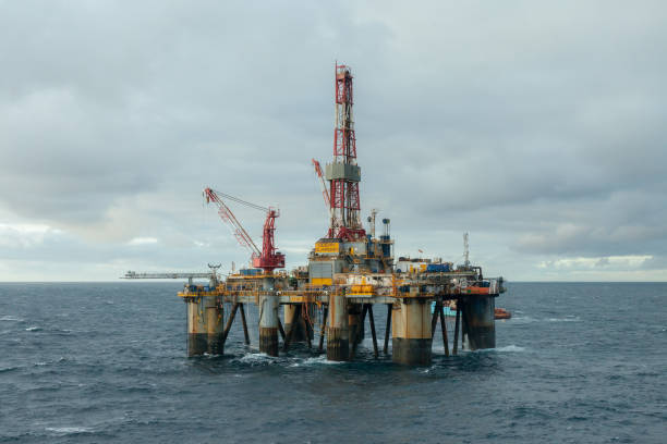 The semi-submersible drilling rig Ocean Guardian at location. NORTH SEA SCOTLAND - 2015 NOVEMBER 09. The semi-submersible drilling rig Ocean Guardian at location. north sea oil and gas stock pictures, royalty-free photos & images