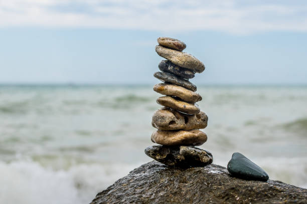 istock Stones placed on top of each other, in balance. 1266114540