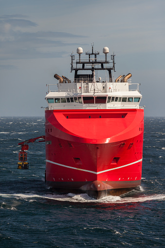 NORTH SEA, SCOTLAND - 2015 MAY 12. Offshore support vessel KL Sandefjord with the Merlin ROV ready for offshore work.