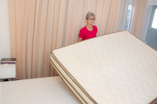 mattress sanitizing lady