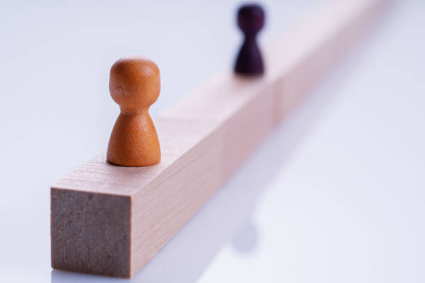 istock Abstract wooden man on a way. 1266120393