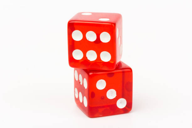 istock Transparent and red glass dices isolated on white background. 1266121739