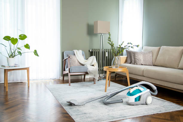istock Vacuum cleaner in living room at home 1266123748